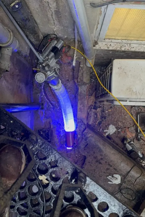 BlueLight LED curing a liner inside a drain